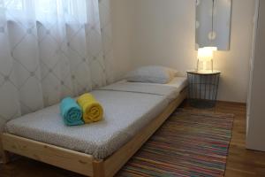 Posteľ alebo postele v izbe v ubytovaní Apartment Pixel
