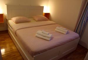 Posteľ alebo postele v izbe v ubytovaní Apartment Pixel