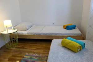 Posteľ alebo postele v izbe v ubytovaní Apartment Pixel