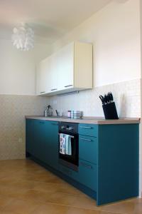 Kuchyňa alebo kuchynka v ubytovaní Apartment Pixel