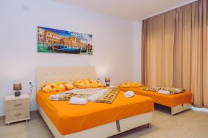 Postel nebo postele na pokoji v ubytování Apartments Krstovic