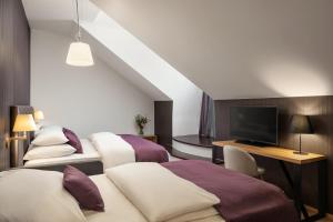 Letto o letti in una camera di MOODs Charles Bridge