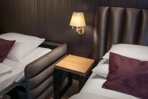 Letto o letti in una camera di MOODs Charles Bridge