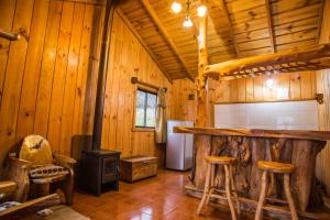 Posezení v ubytování Apart hotel Puchaley Lafquen