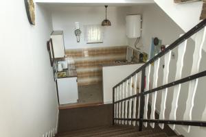 Kuchyň nebo kuchyňský kout v ubytování Apartmani Pucarin