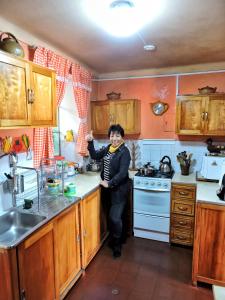 A kitchen or kitchenette at Hostal La Nuit