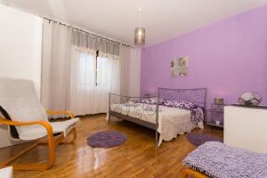 Postel nebo postele na pokoji v ubytování Apartment Lorenzo
