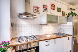 Kuchyňa alebo kuchynka v ubytovaní Cuore di Florio Apartment