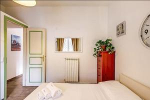 Posteľ alebo postele v izbe v ubytovaní Cuore di Florio Apartment