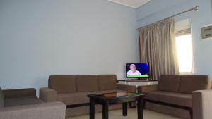 TV a/nebo společenská místnost v ubytování Hotel De Luna