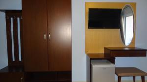 TV a/nebo společenská místnost v ubytování Hotel De Luna