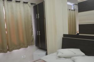 Postel nebo postele na pokoji v ubytování Hotel Calstar