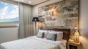 Postel nebo postele na pokoji v ubytování Venezia Hotel
