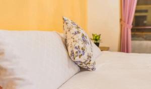 Postelja oz. postelje v sobi nastanitve Yilan B&B - Happy Snail