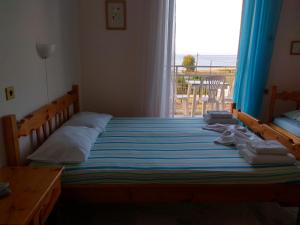 Postel nebo postele na pokoji v ubytování Golden Beach Sea View