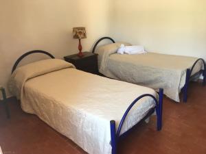 Letto o letti in una camera di Villino Fraginesi