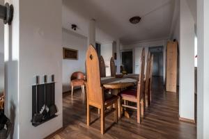 a dining room with a table and chairs at Schloss Auerbach Große Ferienwohnung in Bensheim