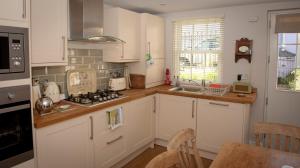 Gallery image of Stamps 'Cosy' Cottage with Spa Hot Tub, Parking & River Walk to the Sea in Uplyme
