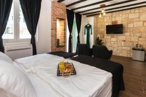 Postel nebo postele na pokoji v ubytování Luxury Rooms Dino
