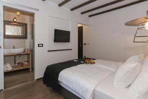 Postel nebo postele na pokoji v ubytování Luxury Rooms Dino