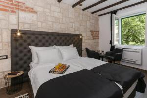 Postel nebo postele na pokoji v ubytování Luxury Rooms Dino
