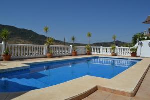 The swimming pool at or close to Villa Las Golondrinas