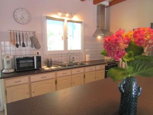 A kitchen or kitchenette at Gîte de Marcadé