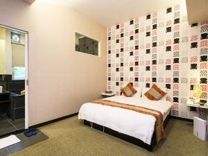 Letto o letti in una camera di Courier Station