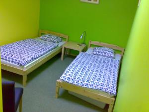 Postel nebo postele na pokoji v ubytování Penzion Cihelna