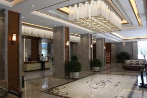 Ο χώρος του λόμπι ή της ρεσεψιόν στο Fu Hua International Hotel Dunhuang