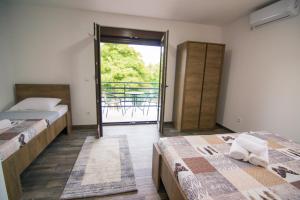 Ένα ή περισσότερα κρεβάτια σε δωμάτιο στο Villa Sabina
