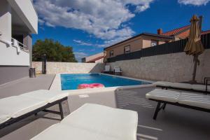 Bazén v ubytování Residences Bellavista 3 nebo v jeho okolí