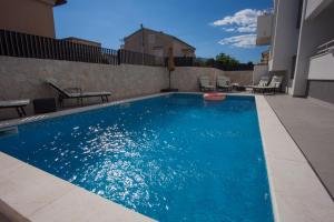 Bazén v ubytování Residences Bellavista 3 nebo v jeho okolí