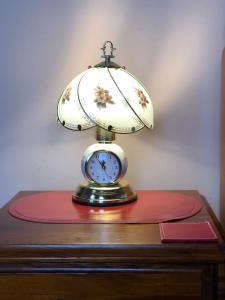 a lamp that is on top of a table at Albany Foreshore Guest House in Albany