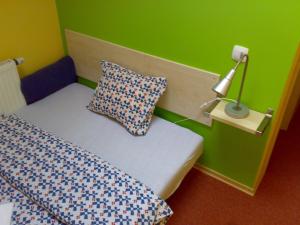 Postel nebo postele na pokoji v ubytování Penzion Cihelna