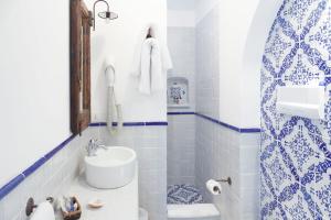 Koupelna v ubytování Quartara Boutique Hotel