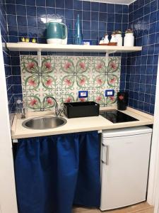 A kitchen or kitchenette at Casa Carraturo