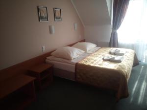 Photo de la galerie de l'établissement Hotelik Zełwągi, à Mikołajki