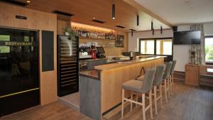 A kitchen or kitchenette at Hotel Alpenfrieden
