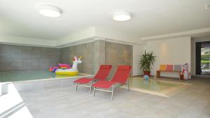 The swimming pool at or close to Hotel Alpenfrieden
