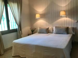 Postel nebo postele na pokoji v ubytování Casa Piscina