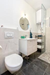 Vannituba majutusasutuses Apartmani Olivette