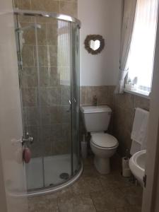 Kylpyhuone majoituspaikassa San Michele Guest House