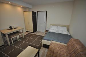 Postel nebo postele na pokoji v ubytování Apartments&Camping ZIP