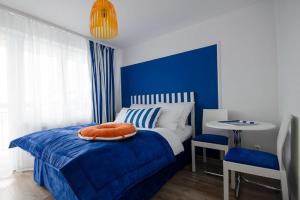 Postel nebo postele na pokoji v ubytování Pokoje Gościnne Hafen Guesthouse - Władysławowo