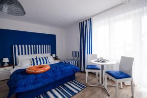 Postel nebo postele na pokoji v ubytování Pokoje Gościnne Hafen Guesthouse - Władysławowo