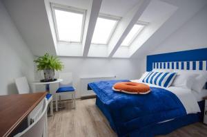 Postel nebo postele na pokoji v ubytování Pokoje Gościnne Hafen Guesthouse - Władysławowo