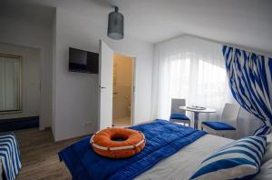 Postel nebo postele na pokoji v ubytování Pokoje Gościnne Hafen Guesthouse - Władysławowo