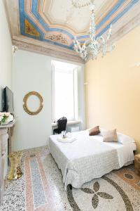 מיטה או מיטות בחדר ב-Nerva Accomodation Cavour