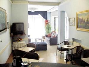 TV a/nebo společenská místnost v ubytování Hotel Firenze